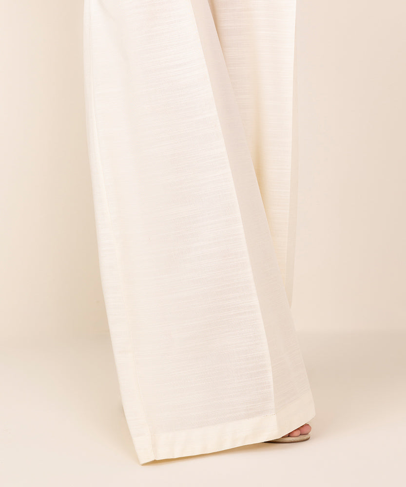 Women's Pret Off White Solid Khaddar Flared Pants