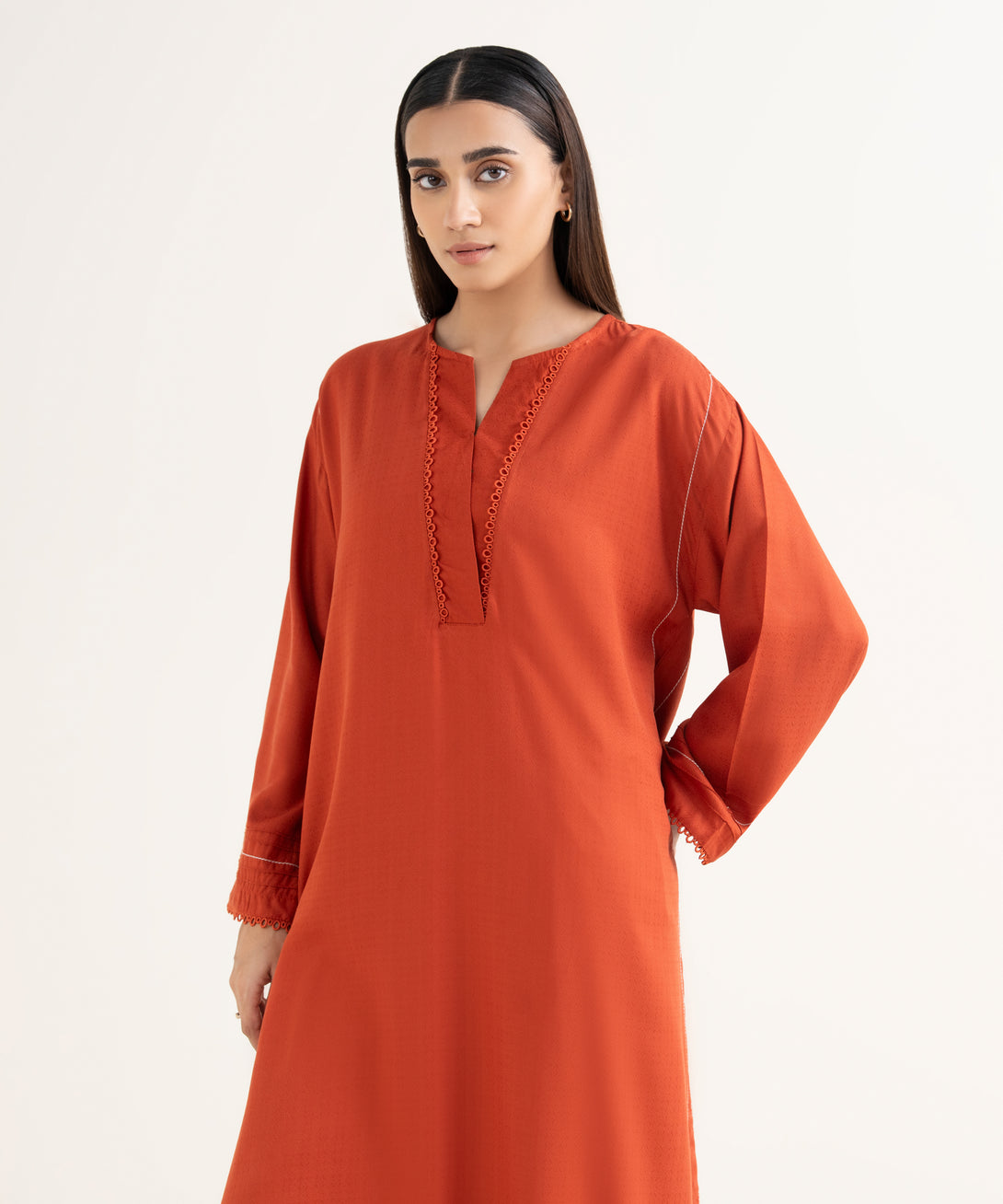Women's RTW Textured Arabic Orange Solid Drop Shoulder Shirt