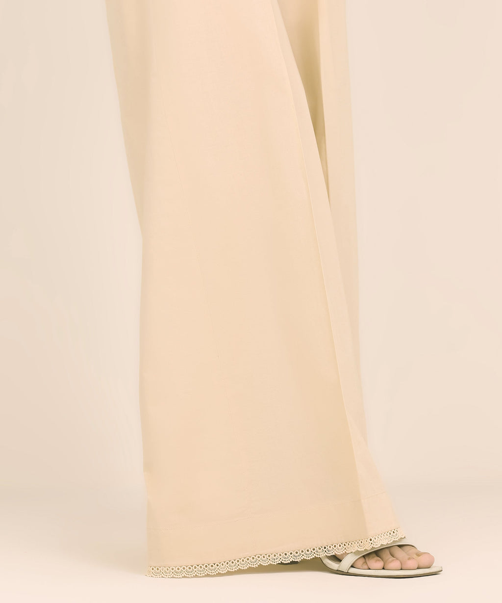 Women's RTW Cambric Beige Solid Flared Pants
